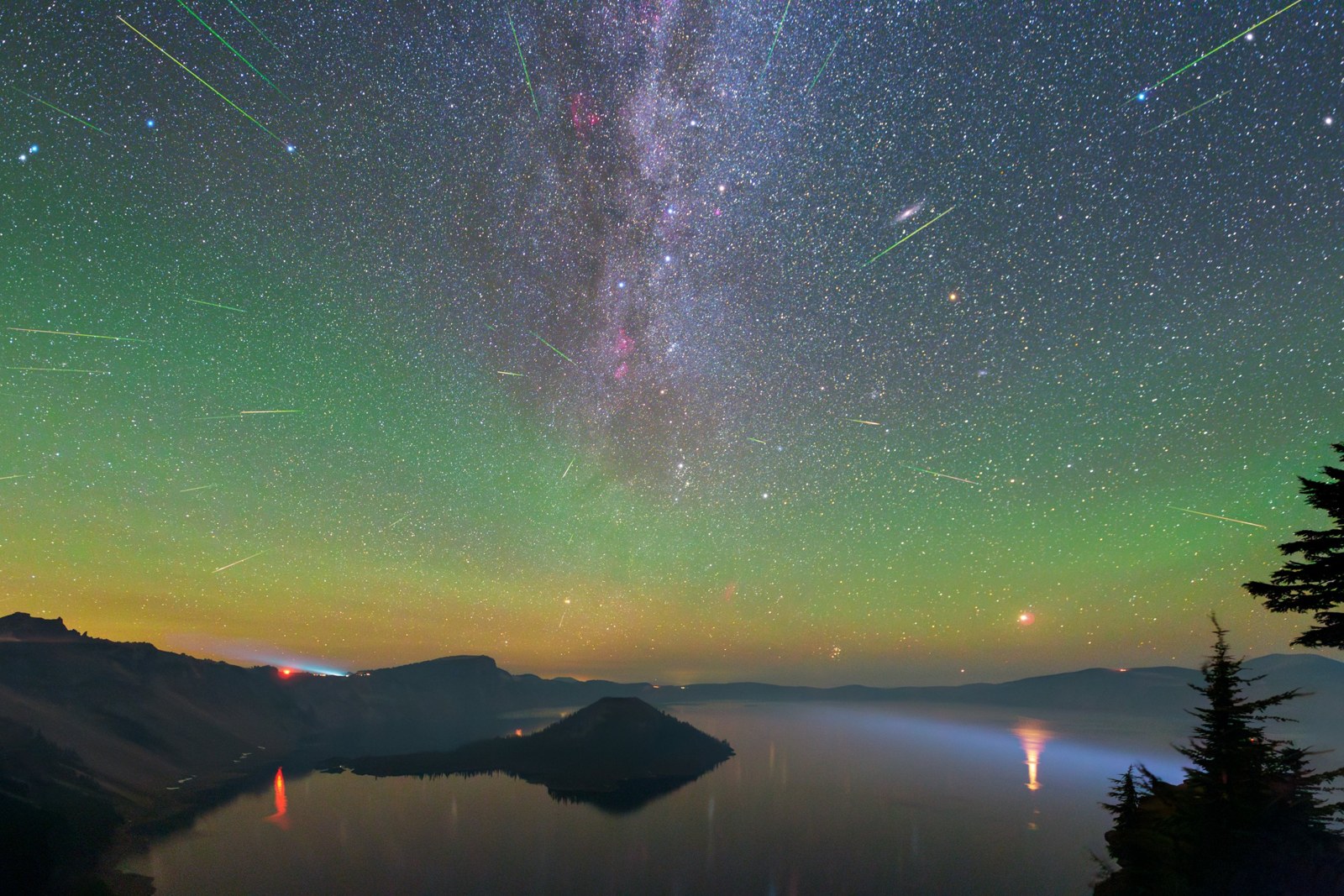 Meteor shower over crater lake
