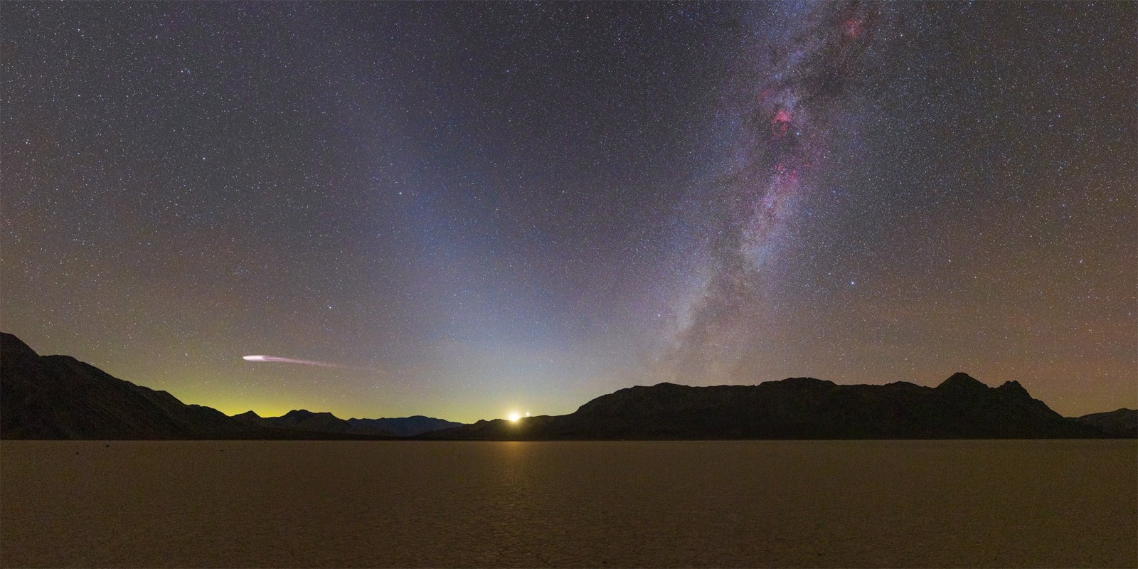 Milky way and zodiacal light over dry lakebed