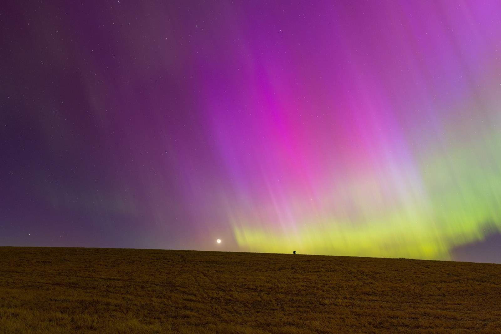 Northern lights and crescent moon panorama