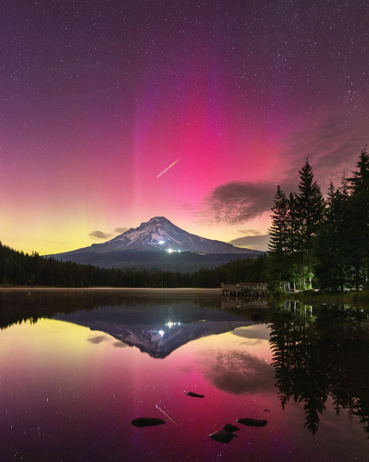 Red aurora reflected below mount hood